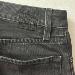 TOTEME Black Cropped Kick Denim Jeans